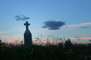 Cross Shaped Tombstone at sunset