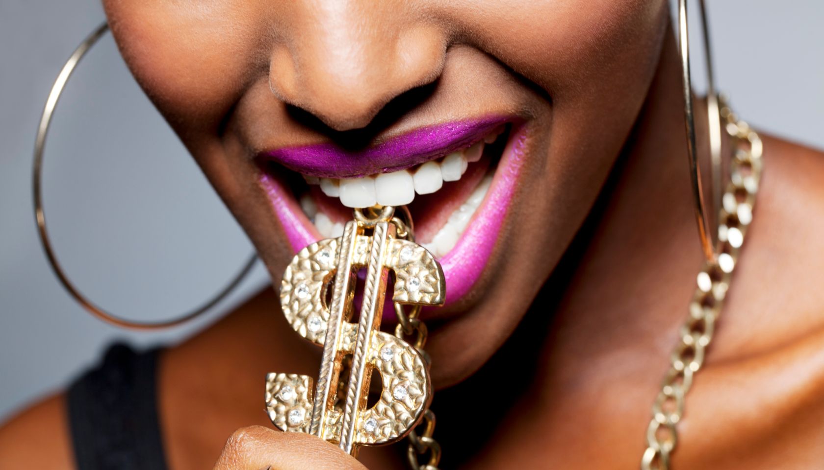 Close Up of Woman's Mouth with Dollar