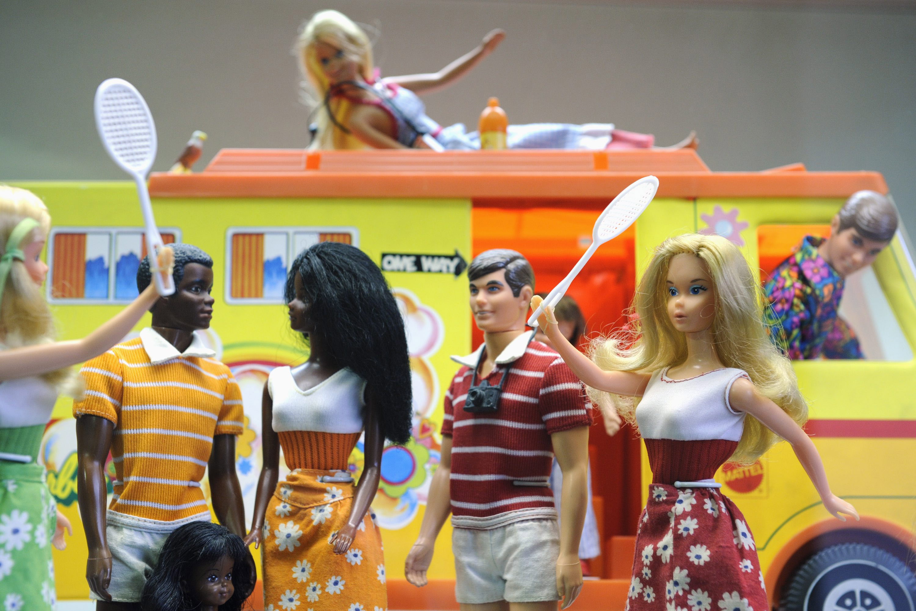 Barbie and Ken dolls are on display at t