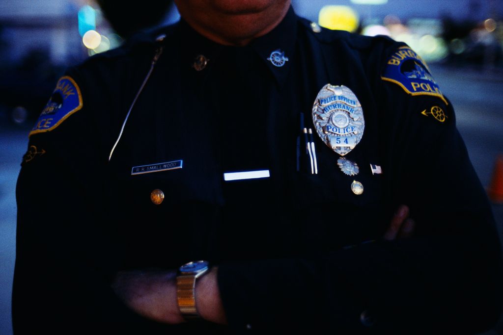 Police Officer with Arms Folded
