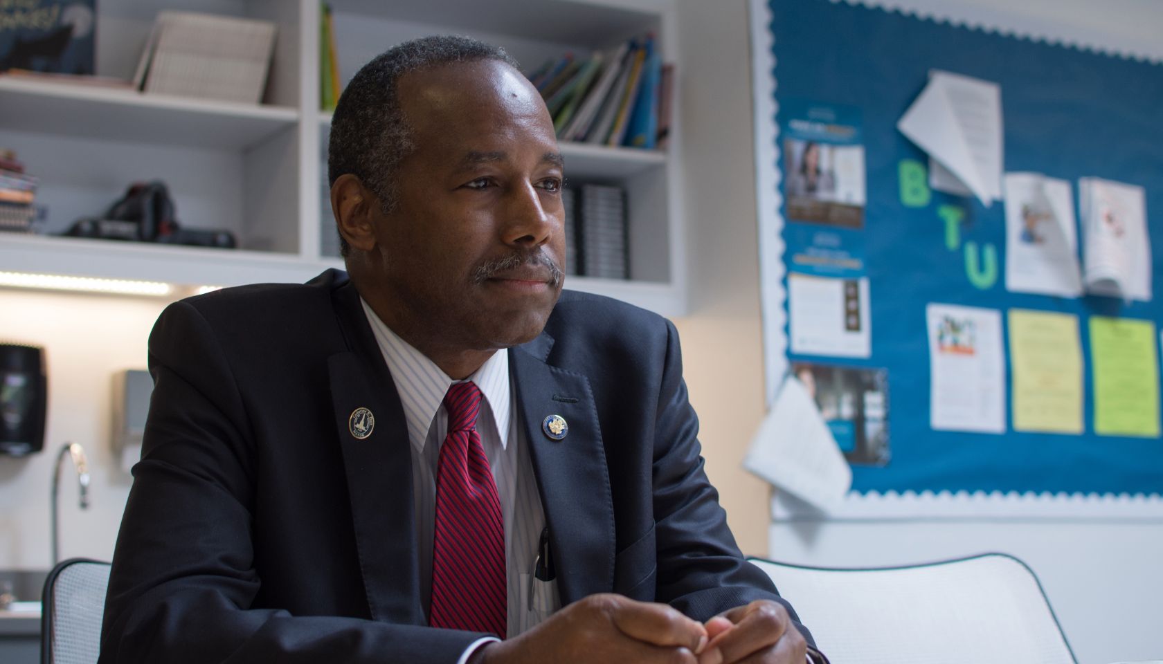 Carson, in return to Baltimore, backs sales of public housing to private developers