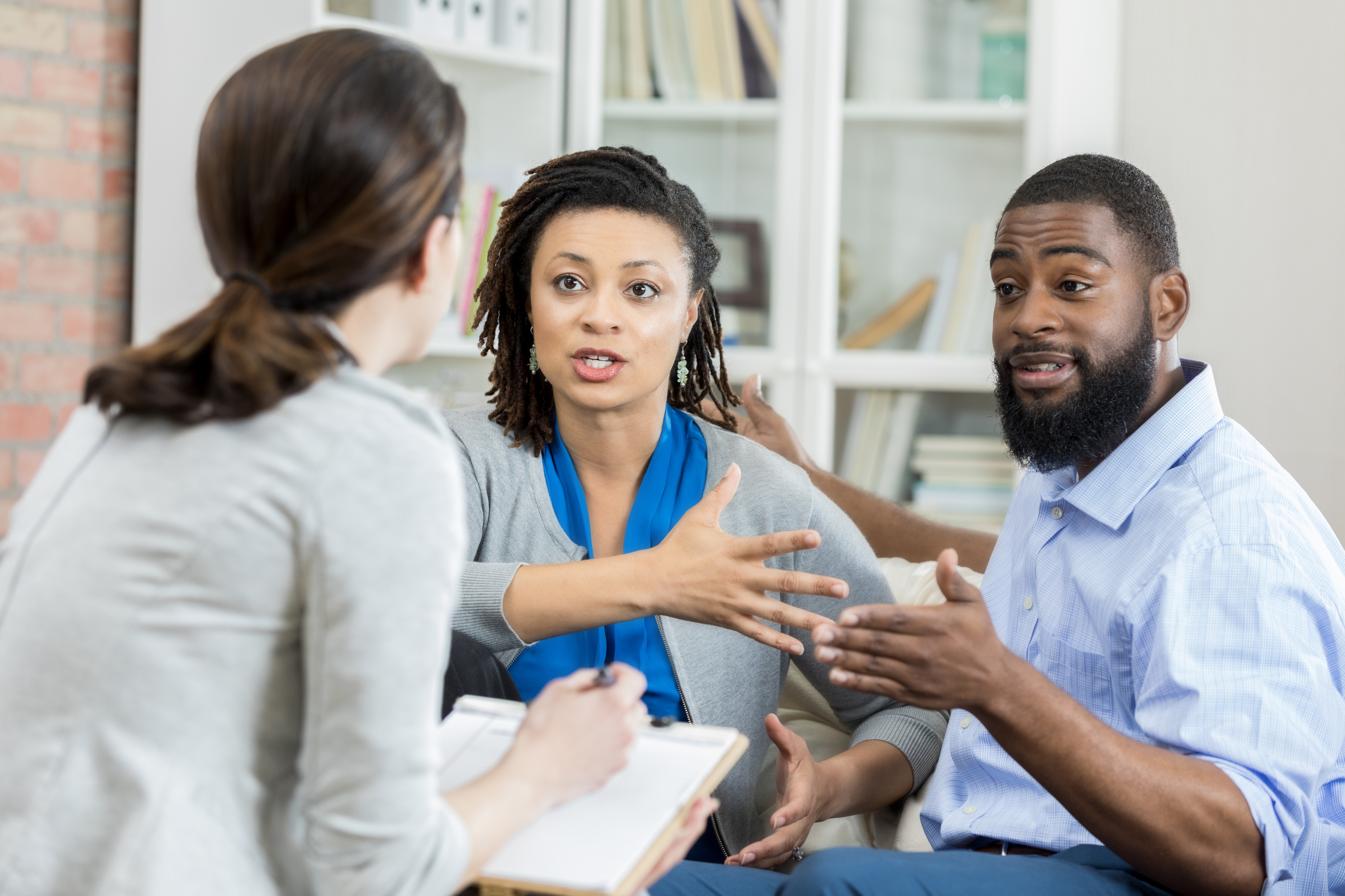 Couple argue during marriage counseling session