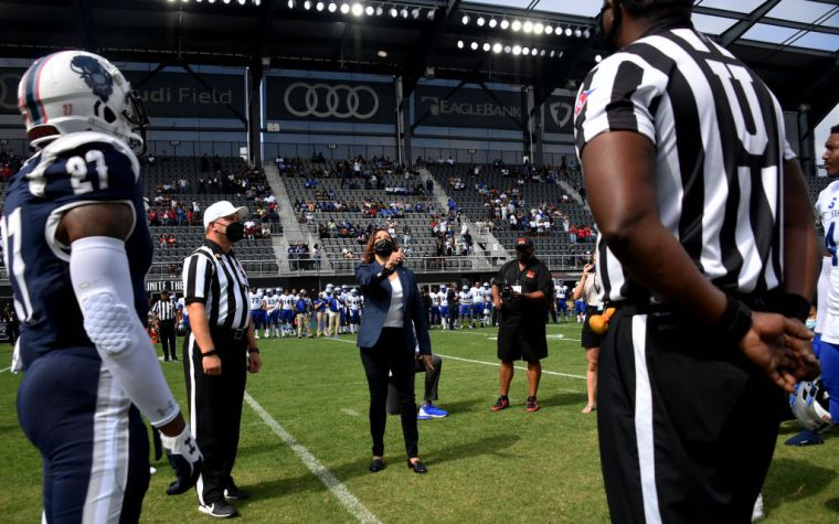 US Vice President Kamala Harris tosses the coin