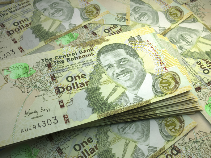 Bahamas banknotes. Bahamasdollar bills. 1 BSD dollars. Business, finance background.